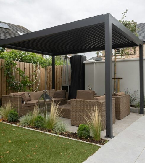 a patio with a couch and a table in it