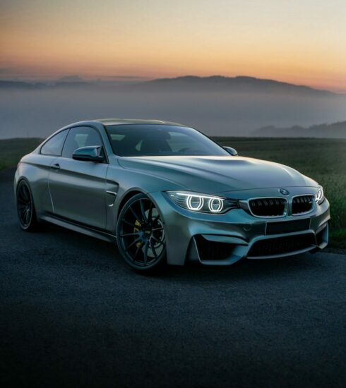 gray mercedes benz coupe on black asphalt road during daytime
